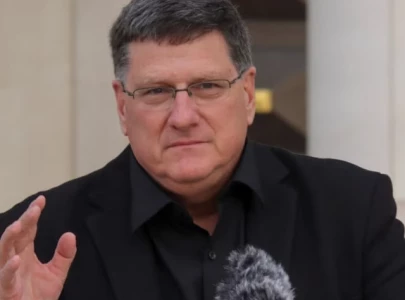 fbi raids two americans tied to russian media